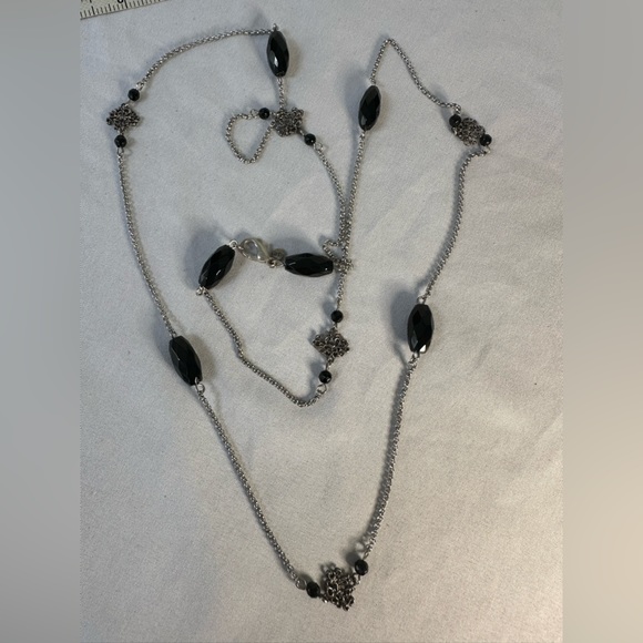 Three black and silvertone vibe necklaces - Picture 5 of 6